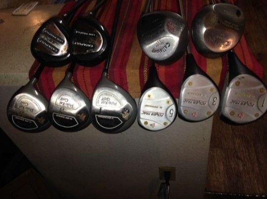 Lots of golf stuff, sets, drivers, shoes, shirts and training tools