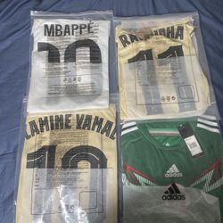 SOCCER JERSEYS ALL HAVE CHAMPIONS LEAGUE BADGE