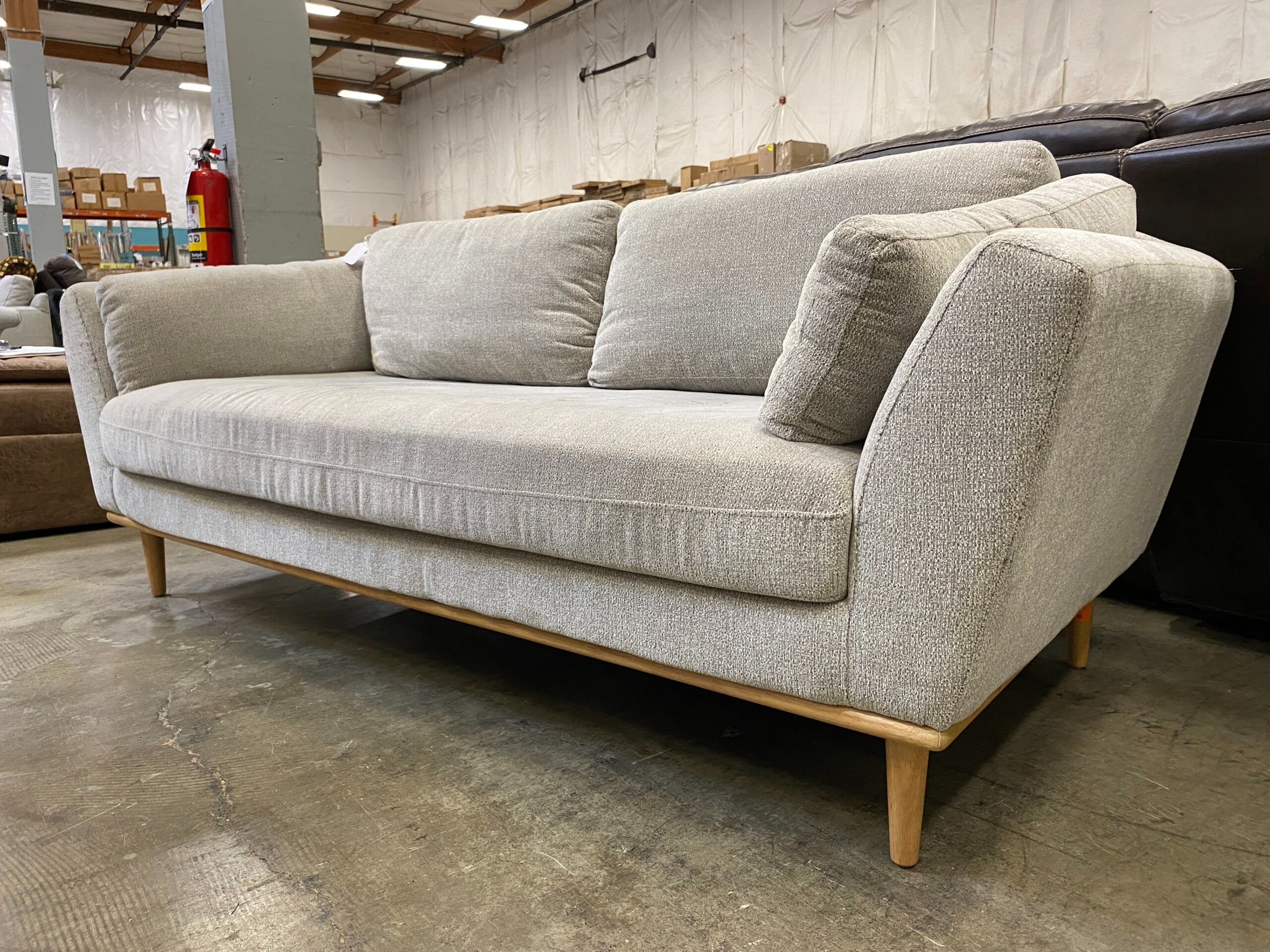 Plush Grey Upholstered Sofa with Wood Legs
