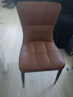 4 Brown leather chairs