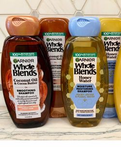 Garnier Whole Blends shampoo and conditioner; Coconut Oil & Cocoa Butter for smoothing frizzy hair; OR Honey Water for moisture restoring dry hair/sca