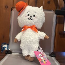 Defected BK7552 14”  BT21 RJ standing plush doll dressed in a signature orange hat and bow tie.