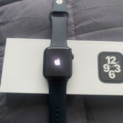Apple Watch SE (1st Generation GPS + Cellular) 44mm Space Gray Aluminum Case with Midnight Sport Ban