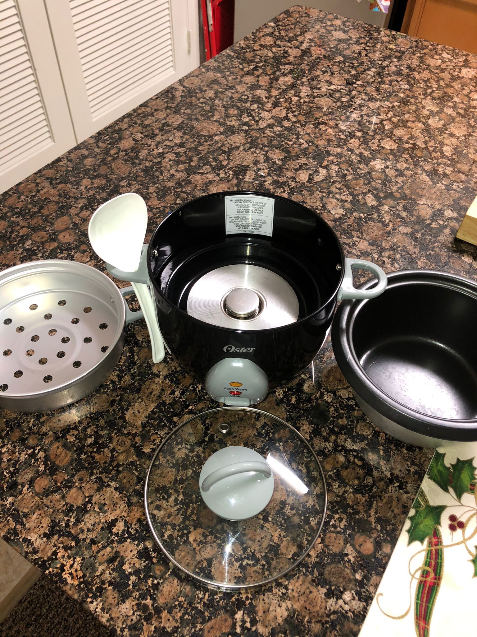 Oster 6-cup Rice cooker With Steamer Tray
