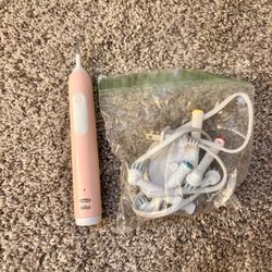 Pink Oral B Electric Toothbrush 