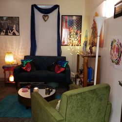 Paisley blue love seat, green chair, mirror coffee table