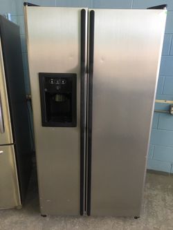 Stainless Side by side refrigerator with ice n water in door