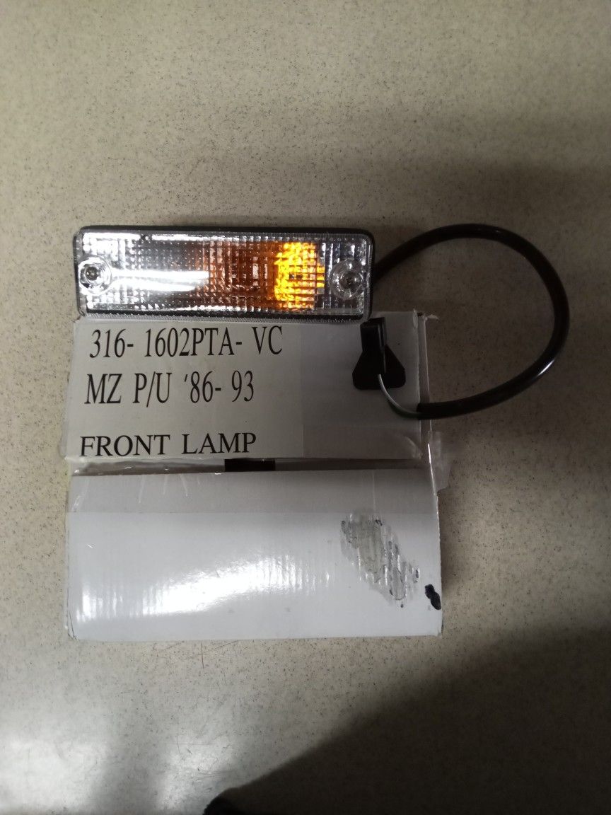 1(contact info removed) Mazda B2200 Front Clear Bumper Lights . Brand New still in the box.