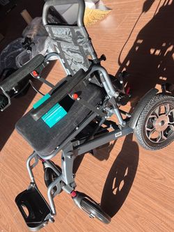 Electric. Wheelchair/brand new in box