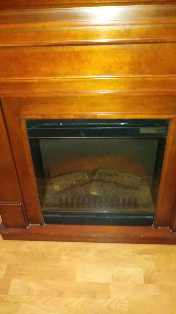 Electric fireplace with mantle needs fuse can deliver for Sale in