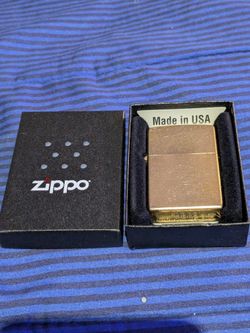 New Gold Dust Zippo