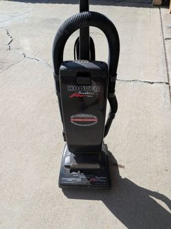 Vintage Hoover Runabout Deluxe upright bagged vacuum is