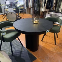 Green modern chairs and table