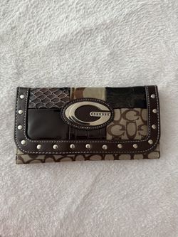 Stylish Patchwork Wallet with Metallic Accents