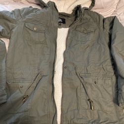 Woman’s Winter Coat Size  Medium 