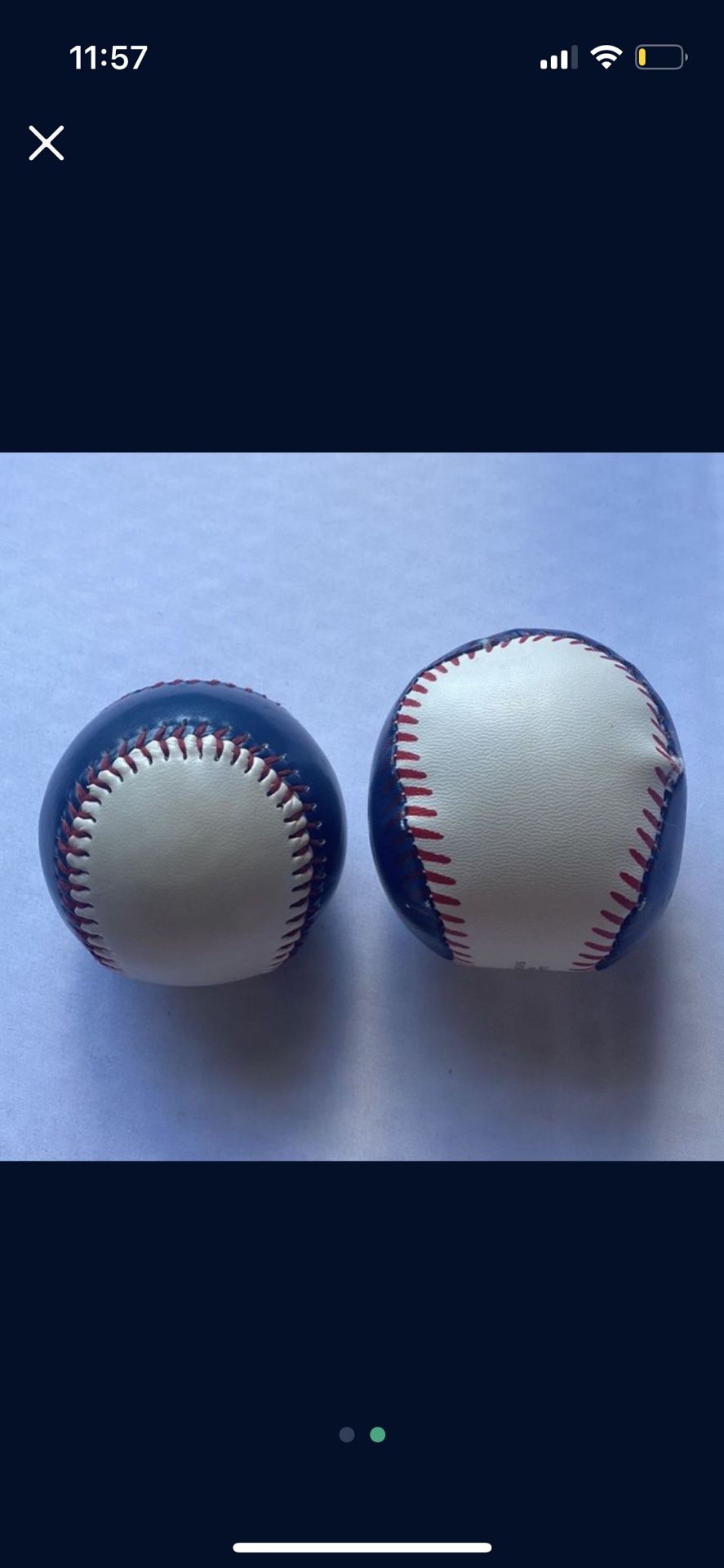 2 thunder baseballs (left one was caught during a game and right one is signed)