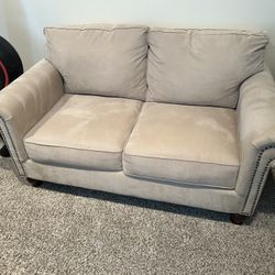Beige Upholstered Loveseat Couch – Excellent Condition