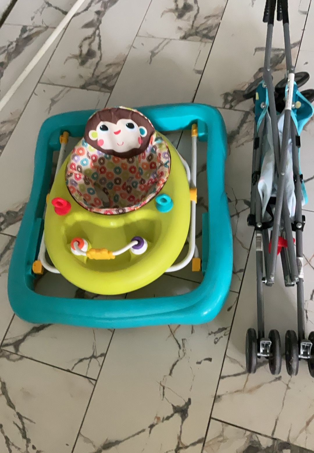 A walker and a baby stroller