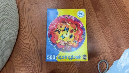 Springbok 500 piece round puzzle colorful bloom