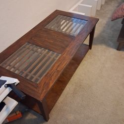 Three piece tables.  Two end tables and one coffee table