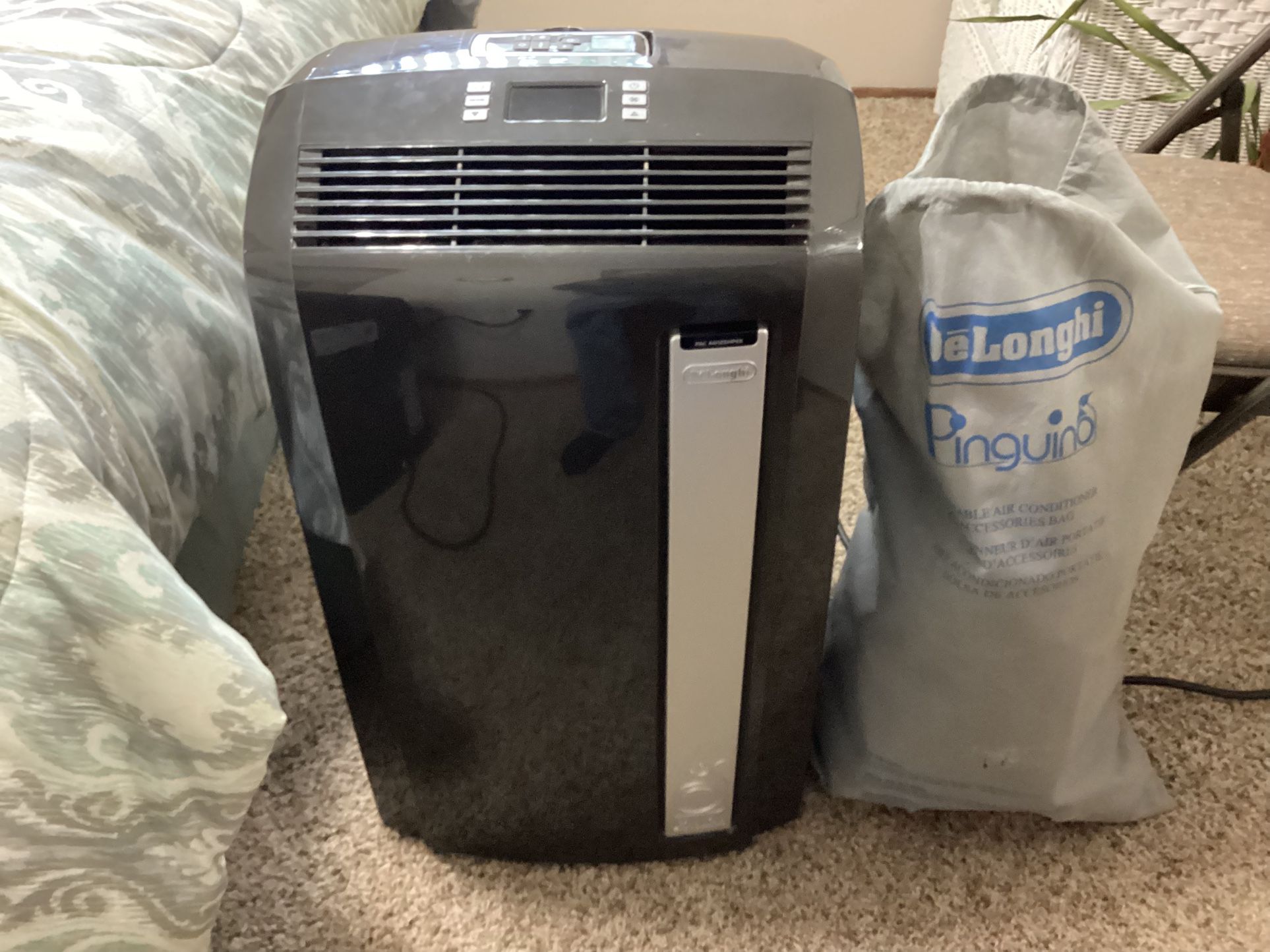 12,500 BTU air conditioner with remote bag covers and window and tubes