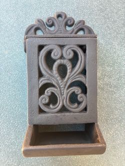 Collectible cast-iron stick match holder prices firm