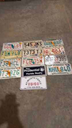 13 license plates from the 70s through the early 90s