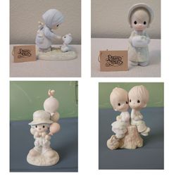 Mint condition Precious Moment figurines. $10 each.