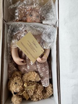 Tender toddler, porcelain doll