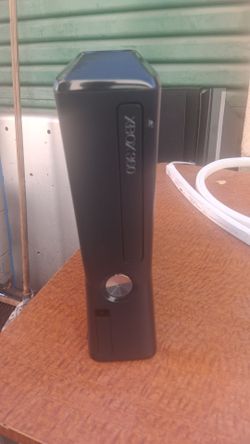 XBOX 360 SLIM tested and operational.  HDMI Cable included and rca. No pwr adapter.