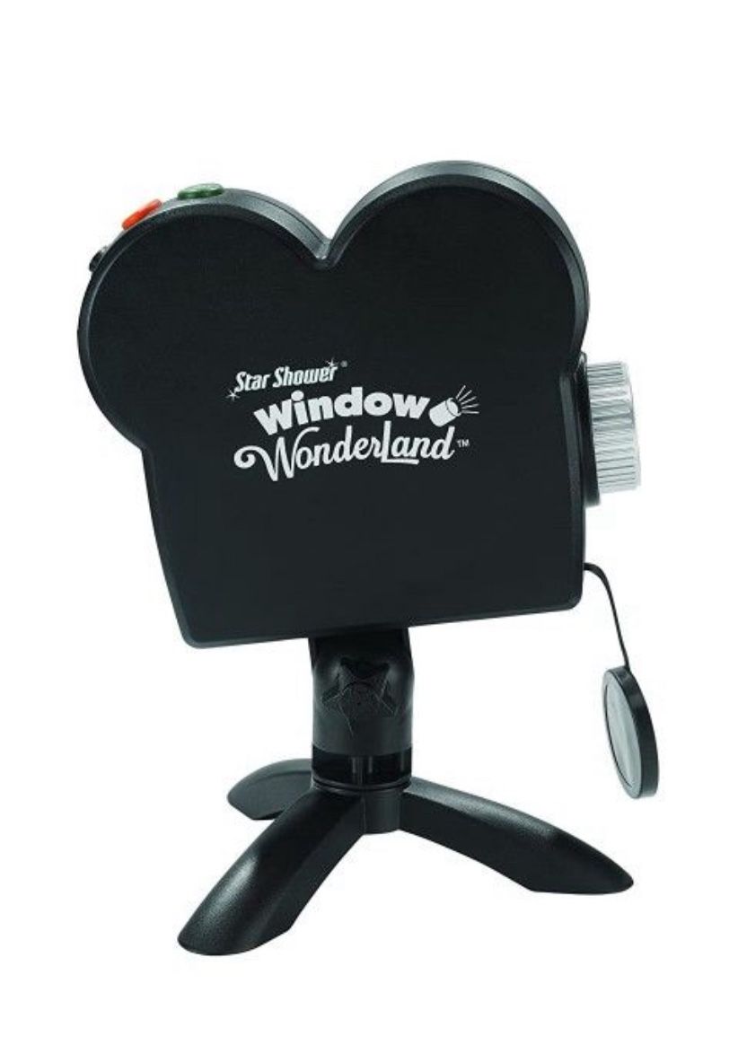 Star Shower Window Wonderland projector used to display holiday-themed movies on windows. Christmas Halloween Movies 