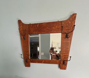 Mirror with hooks
