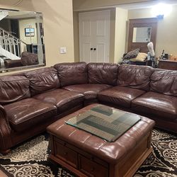 Leather sectional and ottoman decent condition