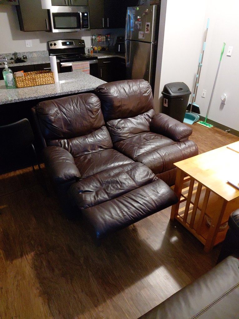 Brown Leather Two Seater Reclining Sofa