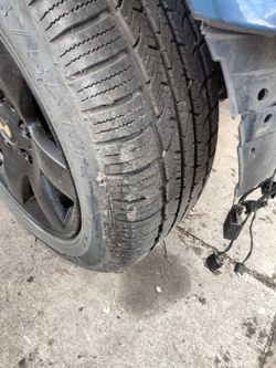 16 Inch Wheels And Tires Off 2004 BMW