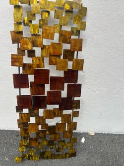 Rare vintage mid century movers MCM  Curtis Jere style brutalist geometric metal wall sculpture from the 1970s featuring torch-cut square tiles in war