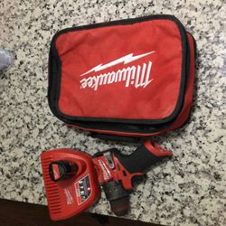 Milwaukee Fuel Drill/ Battery/charger