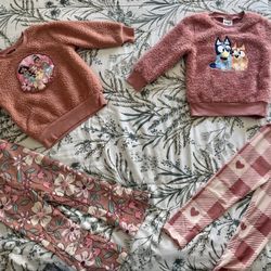 2 sets of toddler girl outfits.
