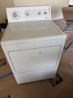 Washer & dryer with hoses and cords.