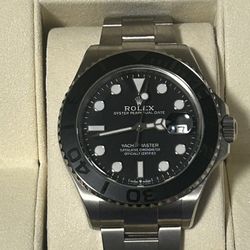 Slightly used Rolex Yacht-Master 42 watch, model number 226627, made of RLX titanium with intense black dial and has warranty card. Seriously inquirie