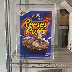 KAWS x Reese’s Puffs Blue Box Limited Edition Cereal SEALED with acrylic case!