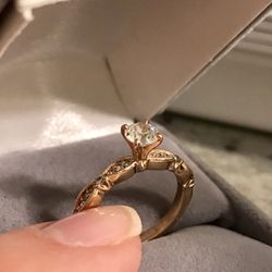 1/2 CT diamond set in 18 k rose gold .LOVE STORY collection