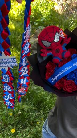 graduation lei and bouquet