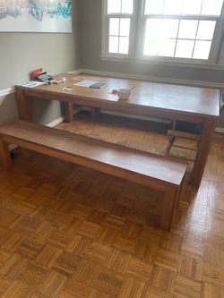 wooden table with benches for both sides