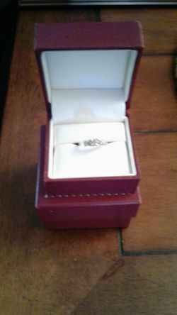 White Gold with Genuine Diamonds.