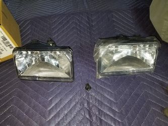 07 & up fog lights new but have broken clip check the pics