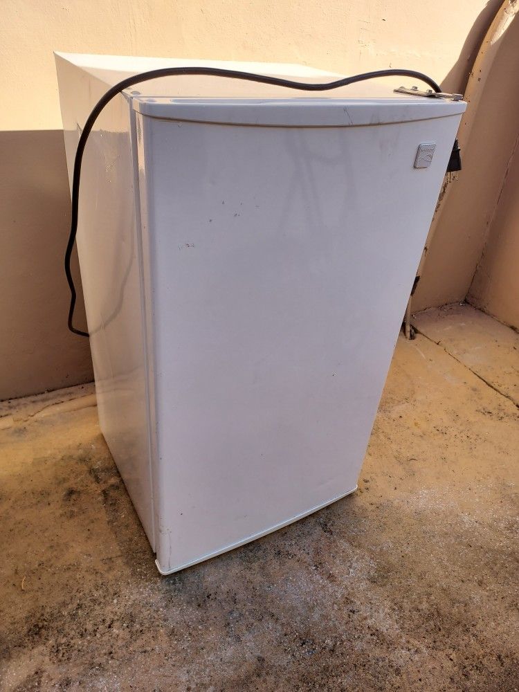 KENMORE White Mini-fridge & freezer. Used with a few scratches but works great! $50.