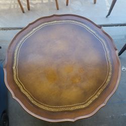 Leather Top Antique Drum Coffee Table With Brass And Wood Carved Accents