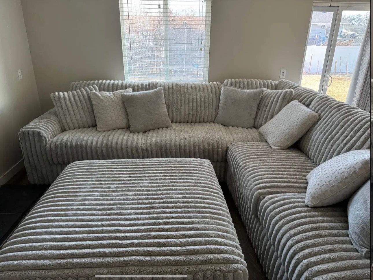 Stupendous 3-Piece Sectional With Ottoman And Throw Pillows