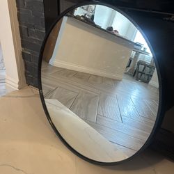Black round mirror